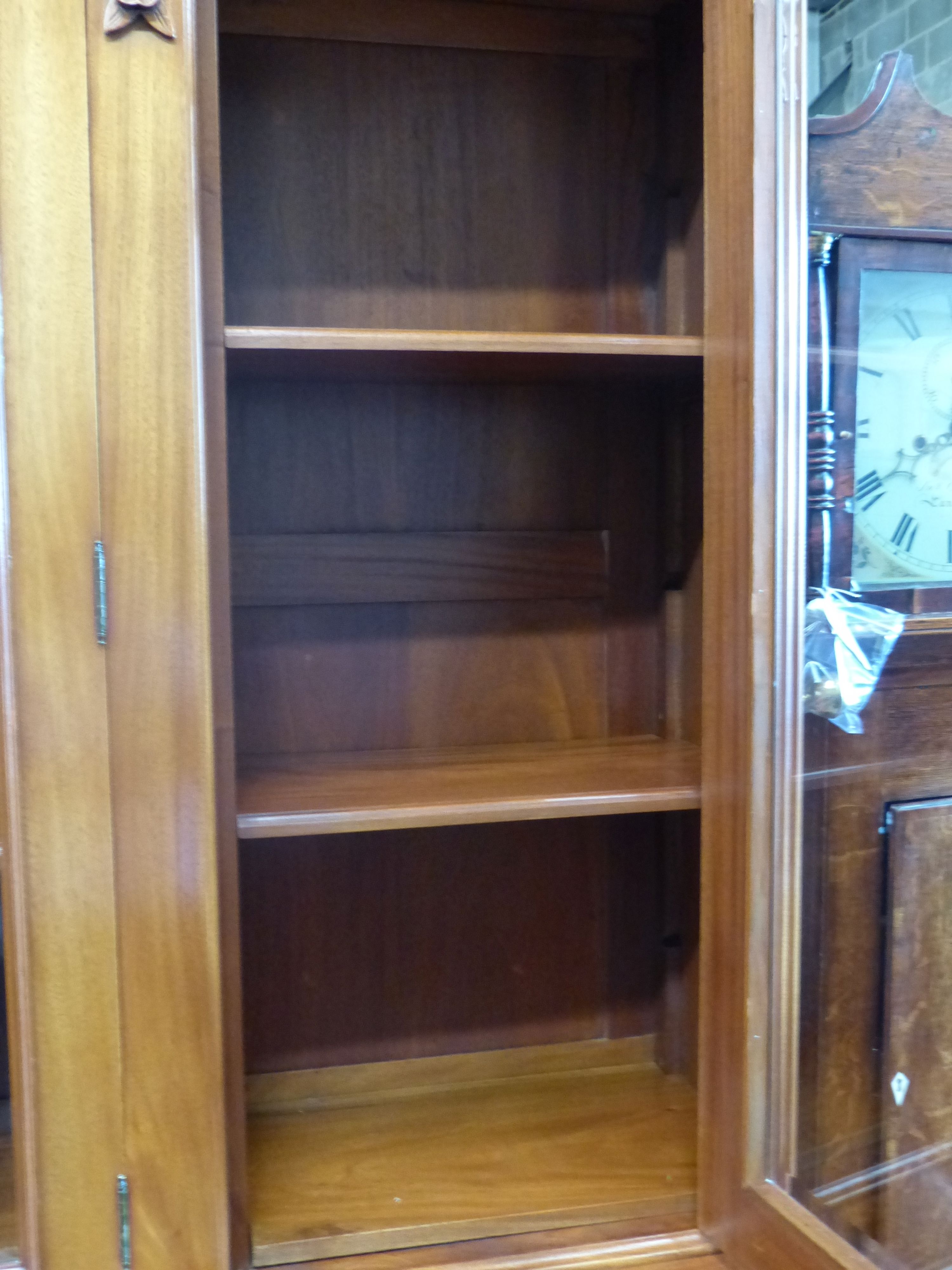 A Victorian style mahogany breakfront library bookcase, length 164cm, depth 48cm, height 218cm